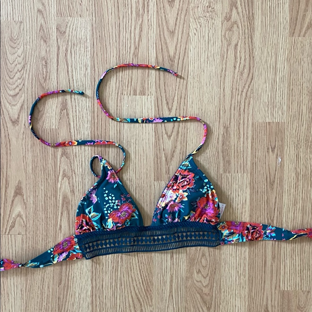 Floral bathing suit top with lace on bottom